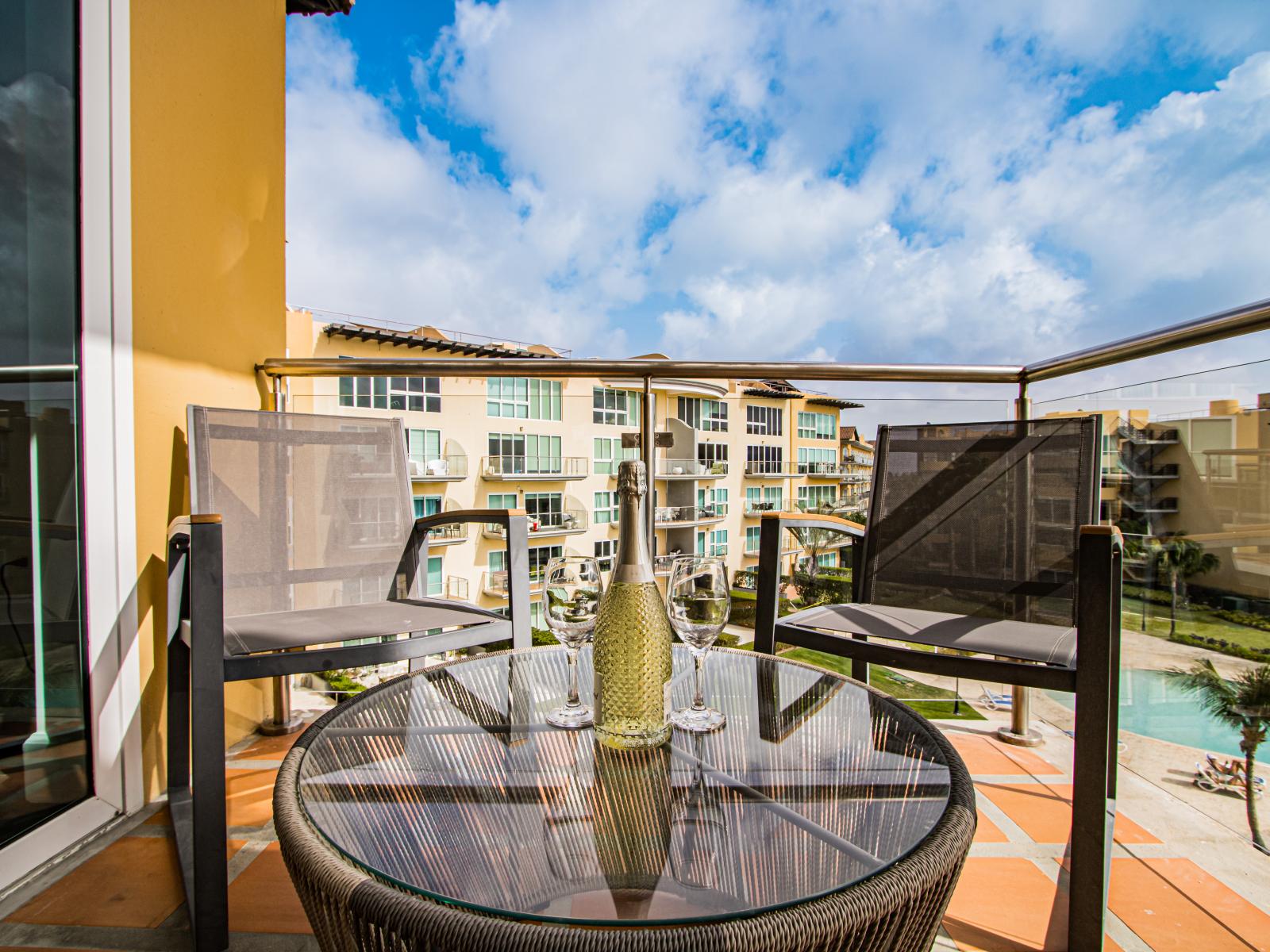 Relax and unwind in our private patio's outdoor lounging area. Perfect for enjoying the sunshine or starlit evenings, this cozy spot invites you to savor peaceful moments in comfort.