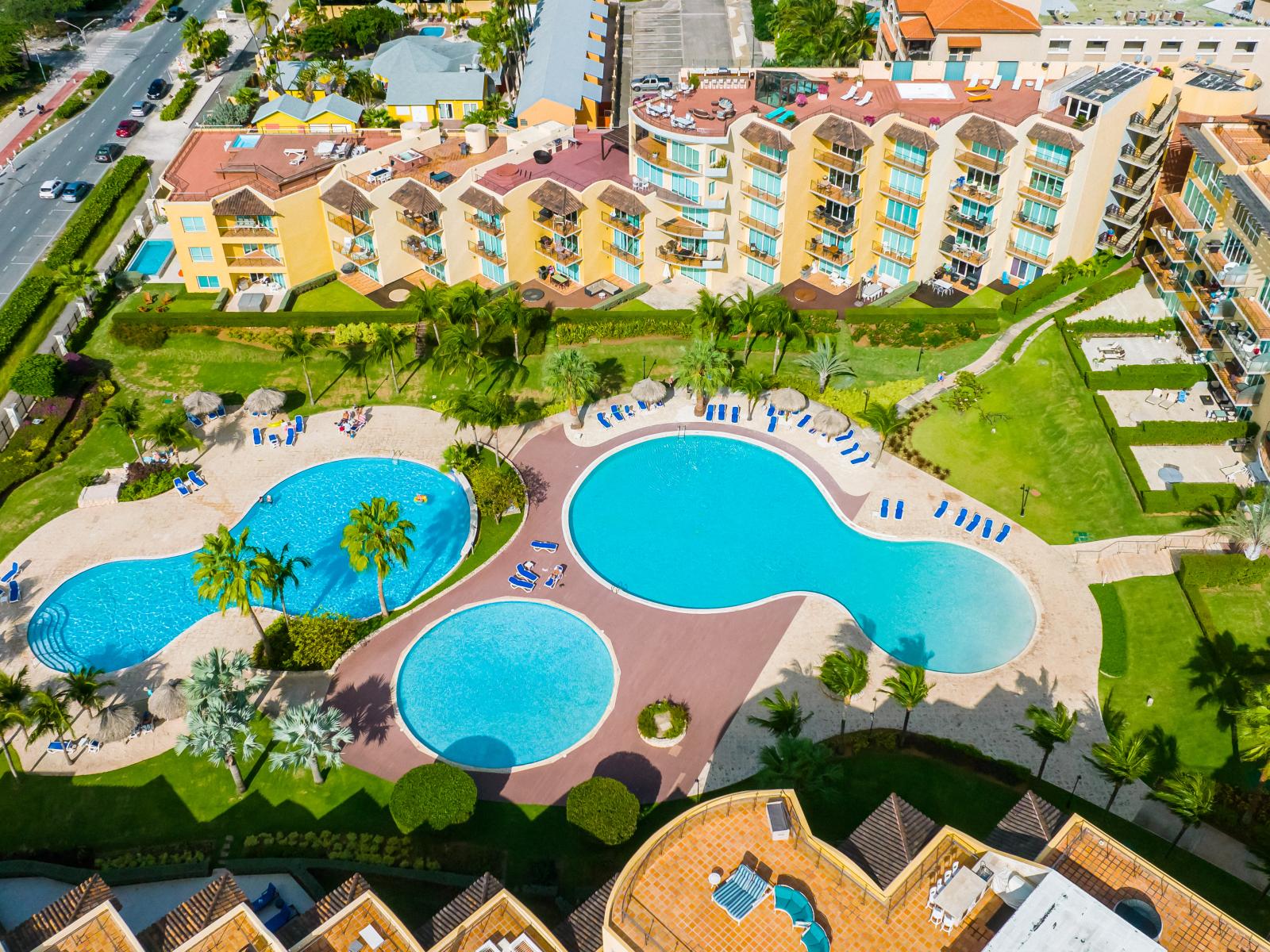 Dive into relaxation at our expansive shared pool, where you can swim, splash, and soak up the sun in style.