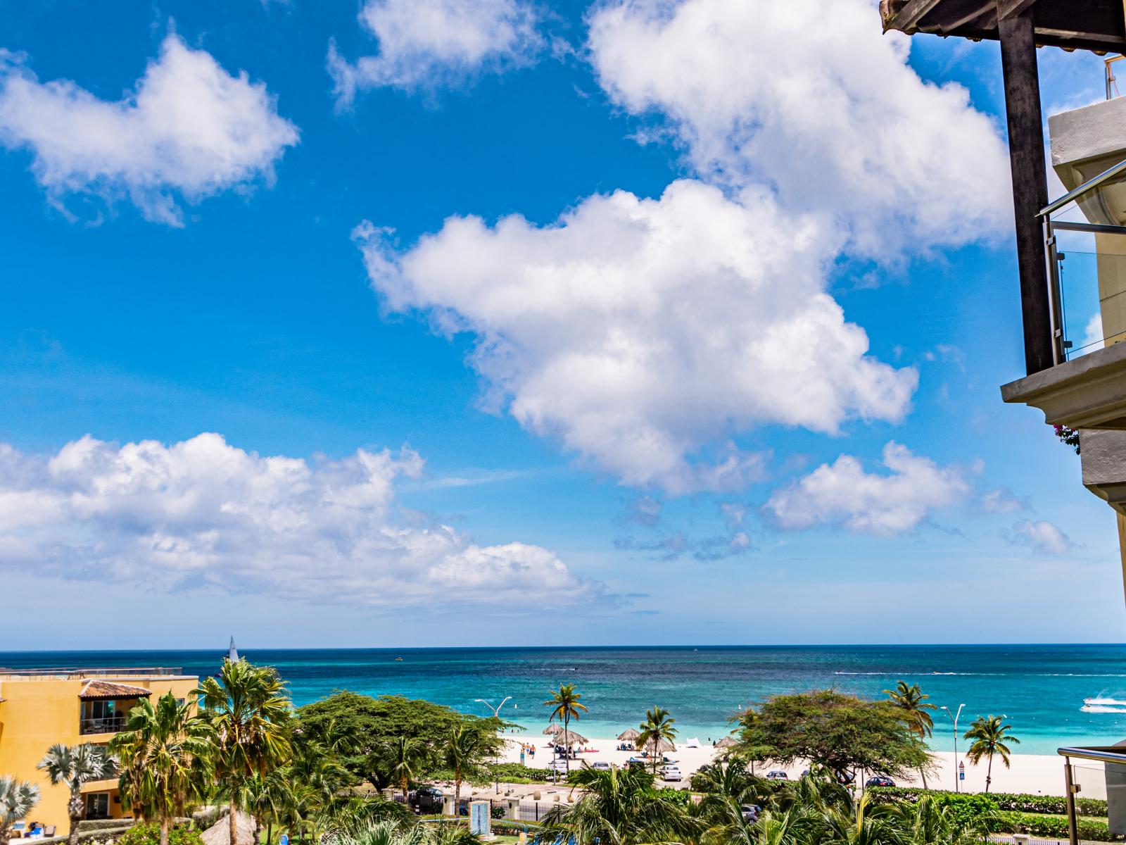 Wake up to the soothing sounds of Eagle Beach just steps away from our condo. Experience the ultimate in beachfront relaxation and natural beauty.