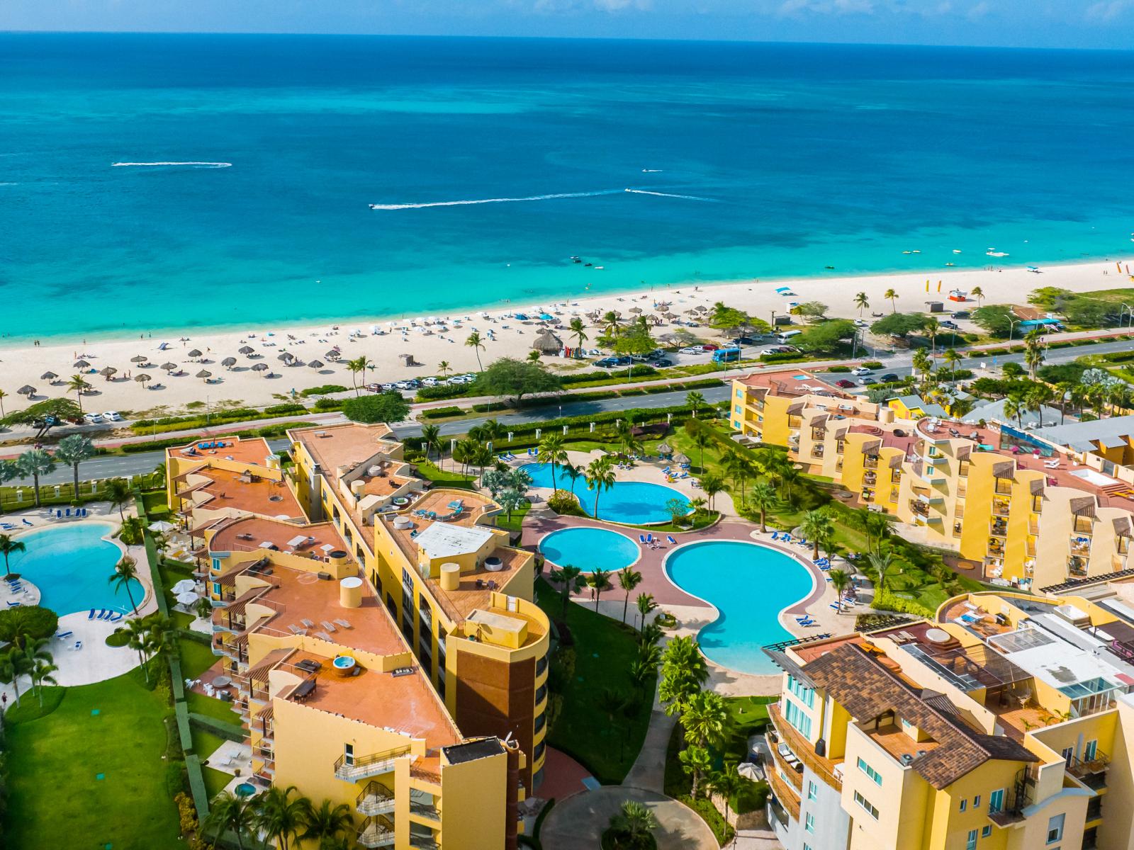 Indulge in the ultimate beachfront experience with our large pool just steps from the soft sands and shimmering waters.