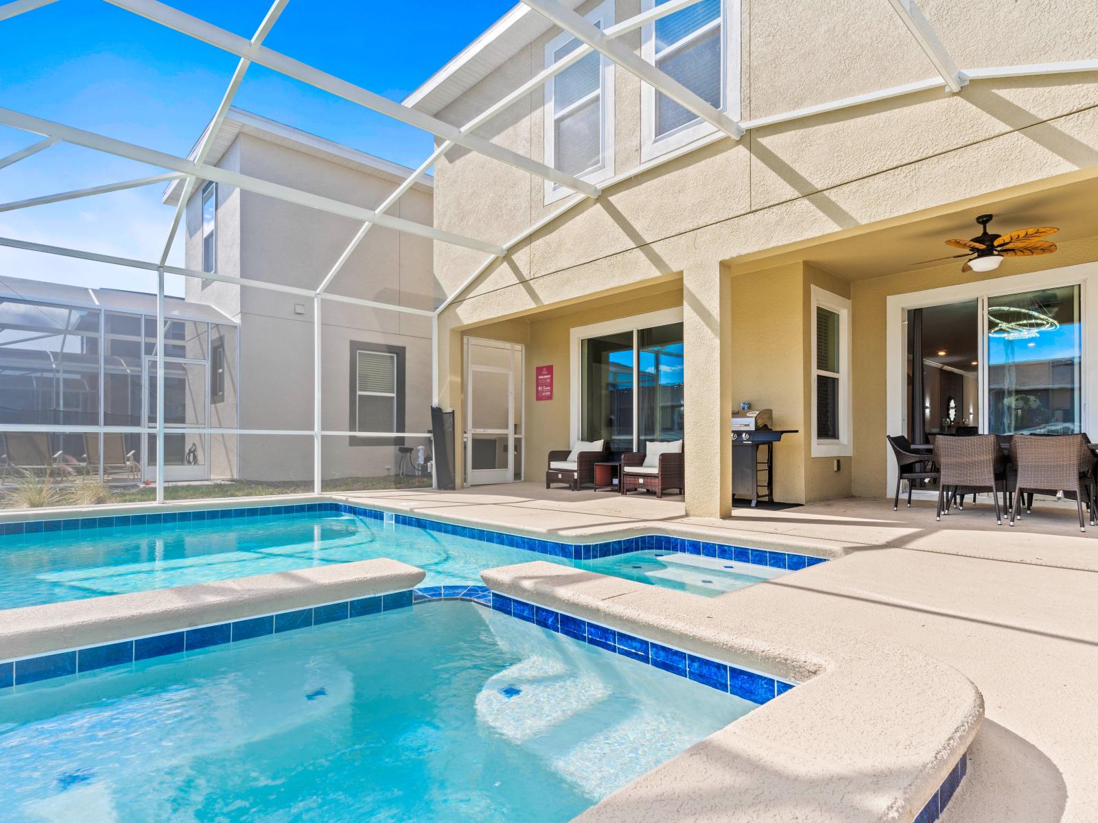 Ritardando Private Pool Area of the Home in Davenport Florida - Midday dip in resort-style pool, equipped with a built-in spa - Cozy outdoor seating