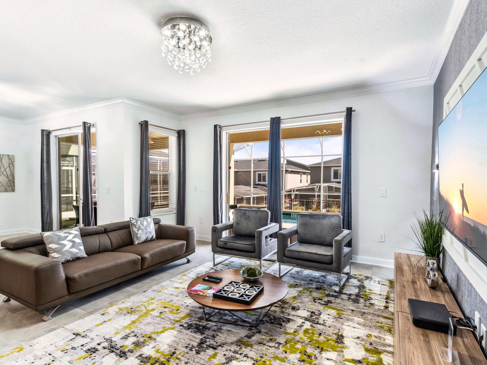 Magnificent Living Area of the Home in Davenport Florida - Beautiful living room with an open layout, creating a sense of spaciousness - Elegantly decorated space with a neutral color palette for a timeless appeal - Smart TV and Netflix