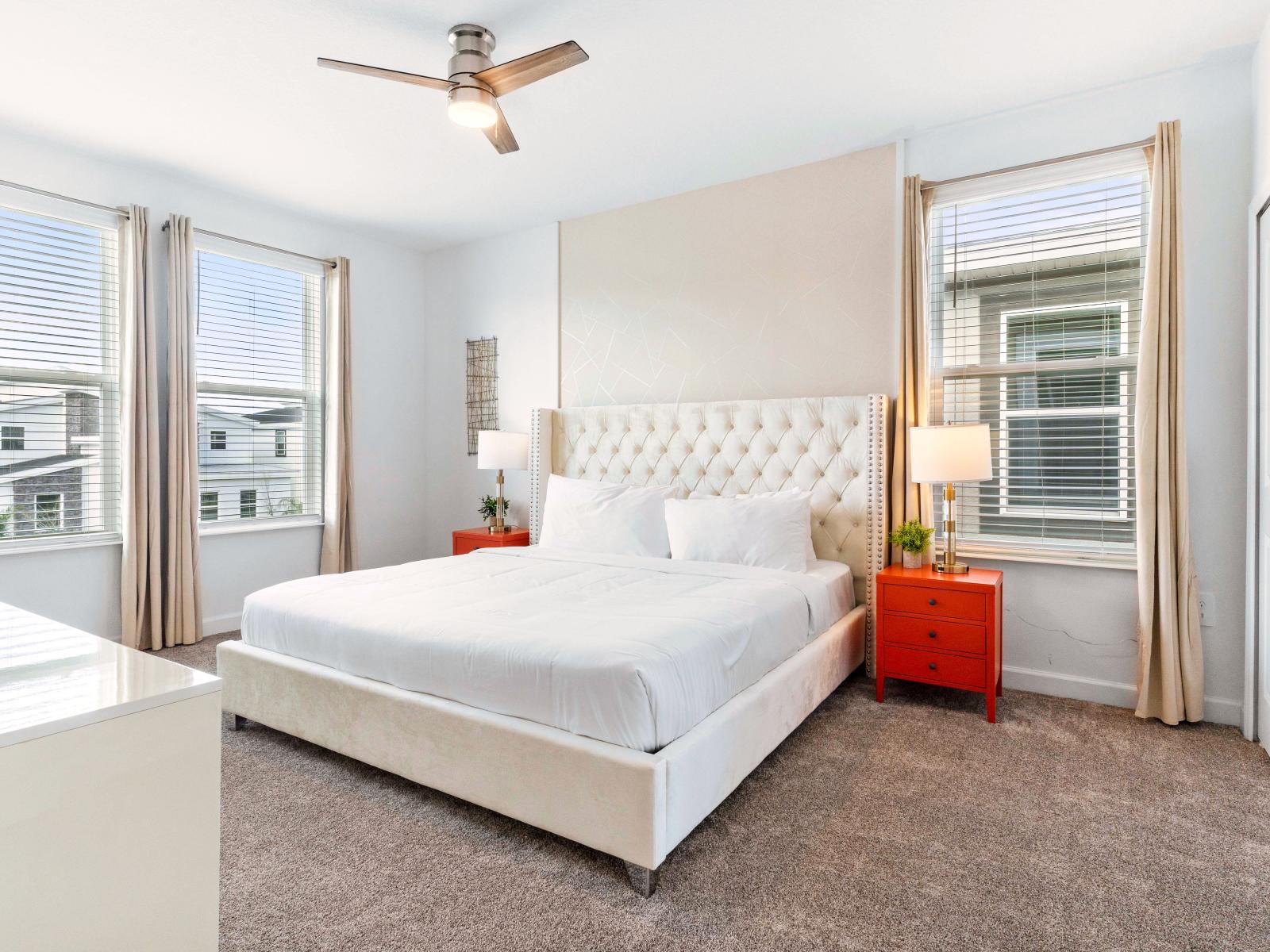 Sublime Bedroom of the Home in Davenport Florida - Cozy Double Bed - Stunning large window of the bedroom with mesmerizing views - Beautiful table Lamps - Plenty of natural light from large windows - Elegantly decored room