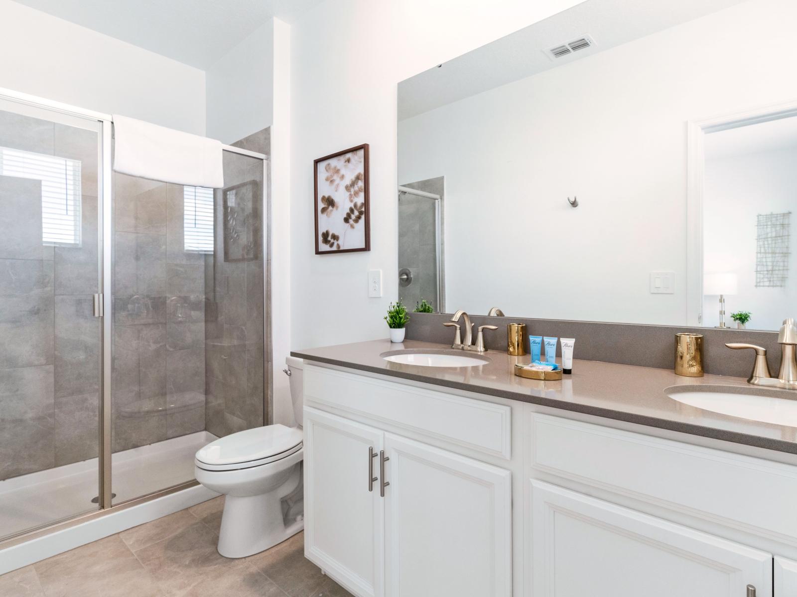 Oristine bathroom of the Home in Davenport Florida - Impeccable design meets spotless luxury - Indulge in the art of self-care in this oasis of cleanliness and sophistication