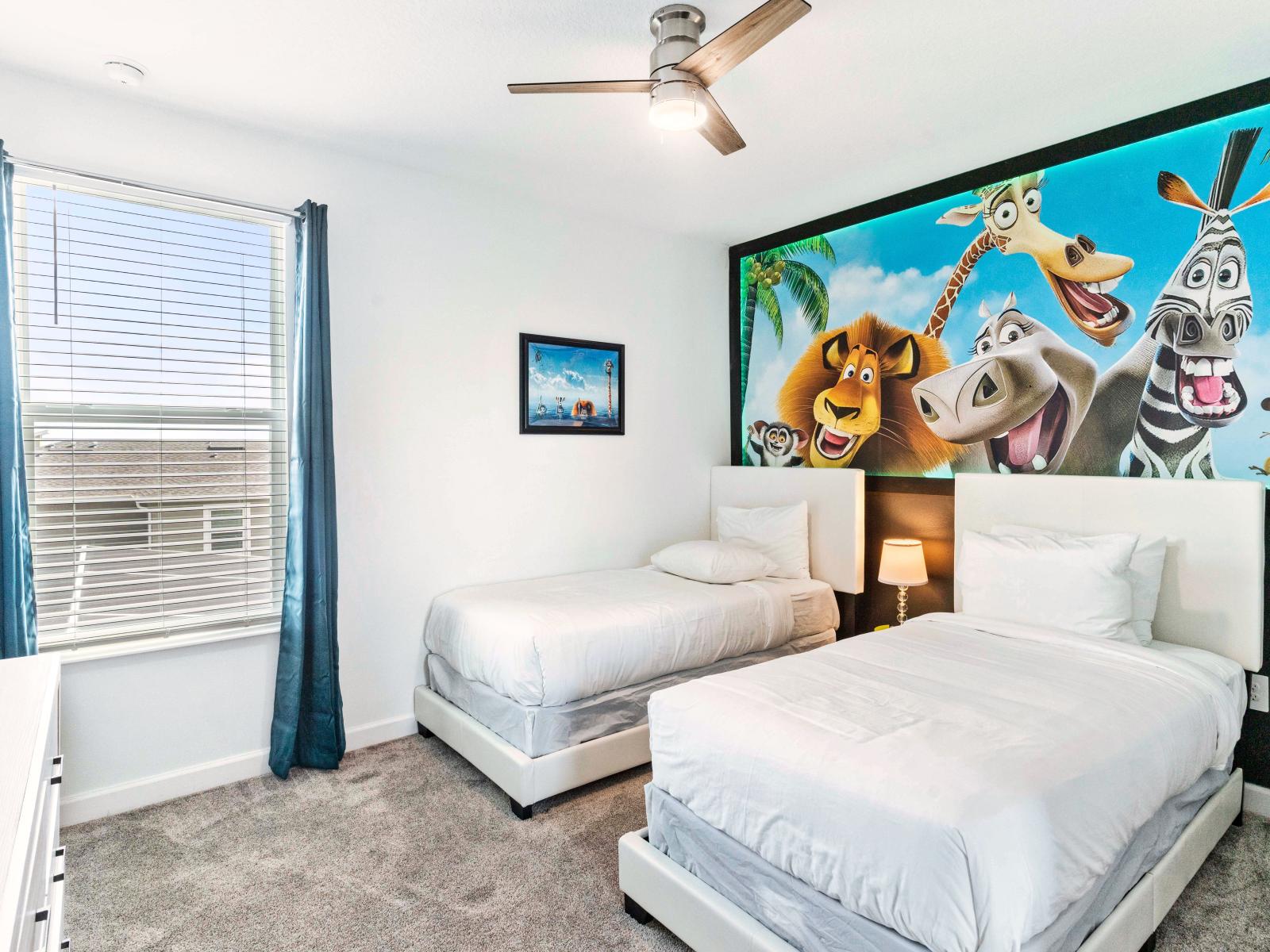 Animal Themed Bedroom of the Home in Davenport Florida - Where imagination takes flight and dreams come to play  - The charming kids room with 2 Single beds - Let the laughter echo and the magic unfold in this special space for little ones