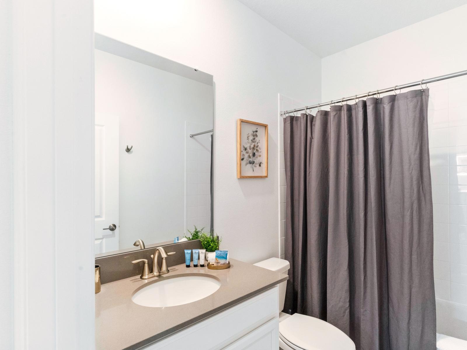 Exquisite bathroom of the Home in Davenport Florida - Crafted for relaxation and rejuvenation - Pamper yourself in this haven of comfort and elegance