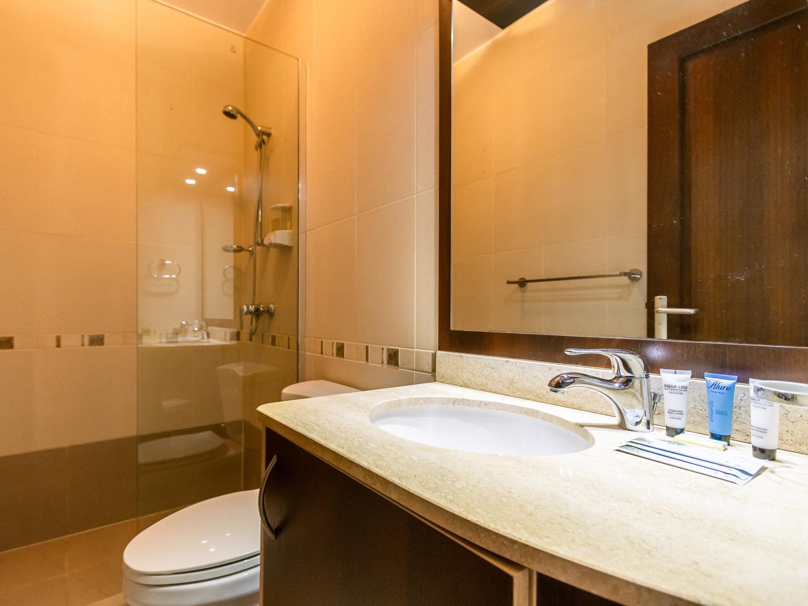 Your private sanctuary: the ensuite bathroom of the main bedroom offers a peaceful retreat from the hustle and bustle.