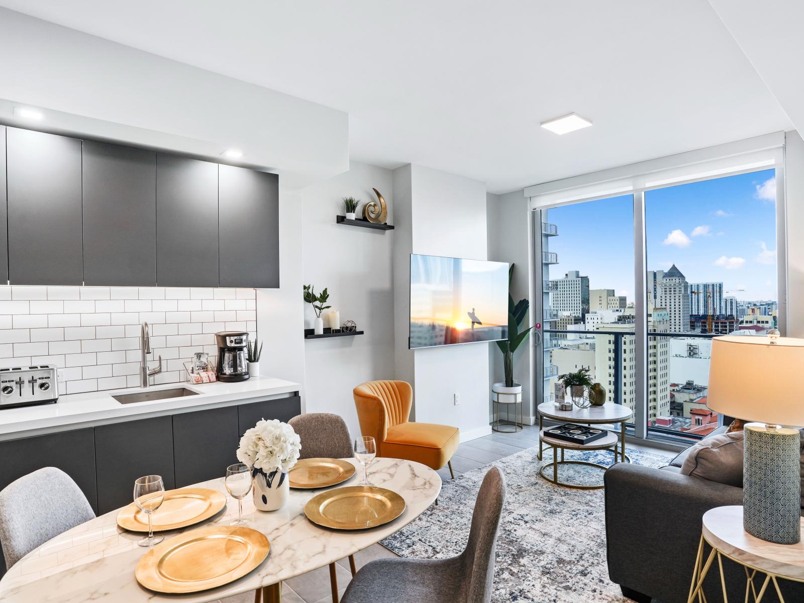 Cozy dining/living space - The open layout of the kitchen, dining and living room is very ideal for family as it makes the room brighter and well-ventilated.