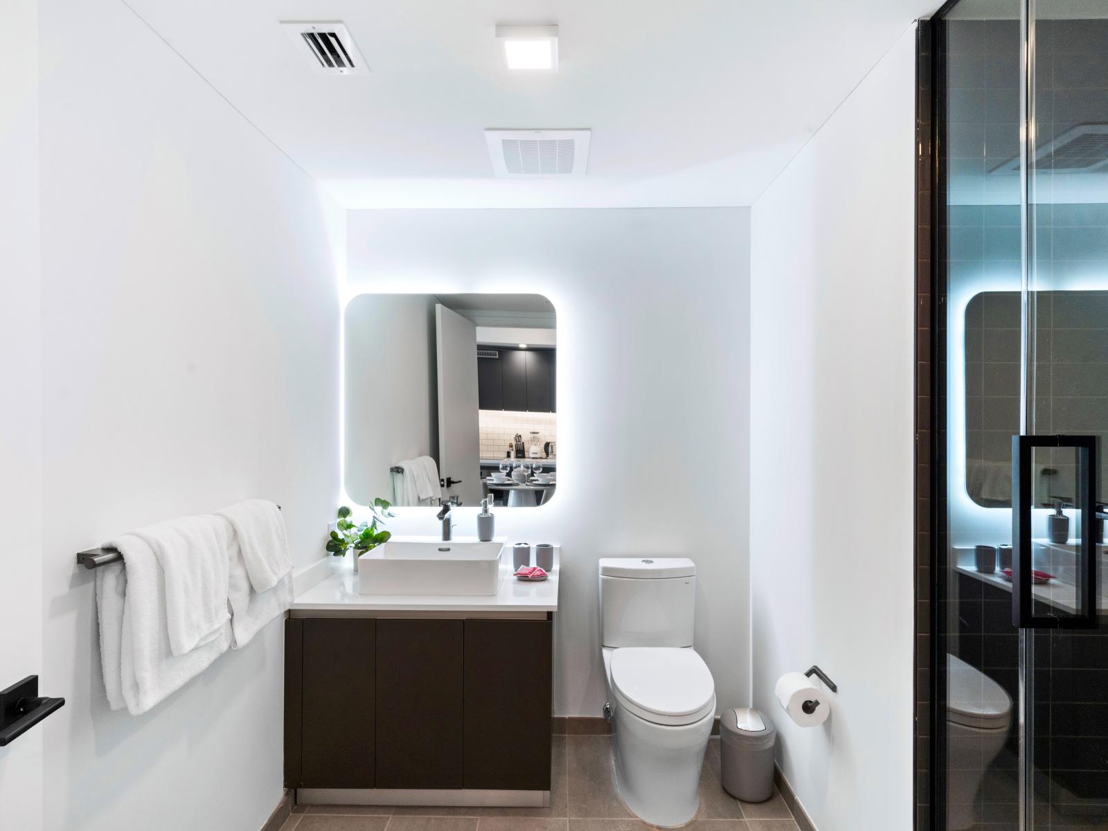 Full bath w/ walk-in shower - Luxurious bathroom with its spacious interior, modern design, and large glass shower stall, perfect for your splash-tastic time.