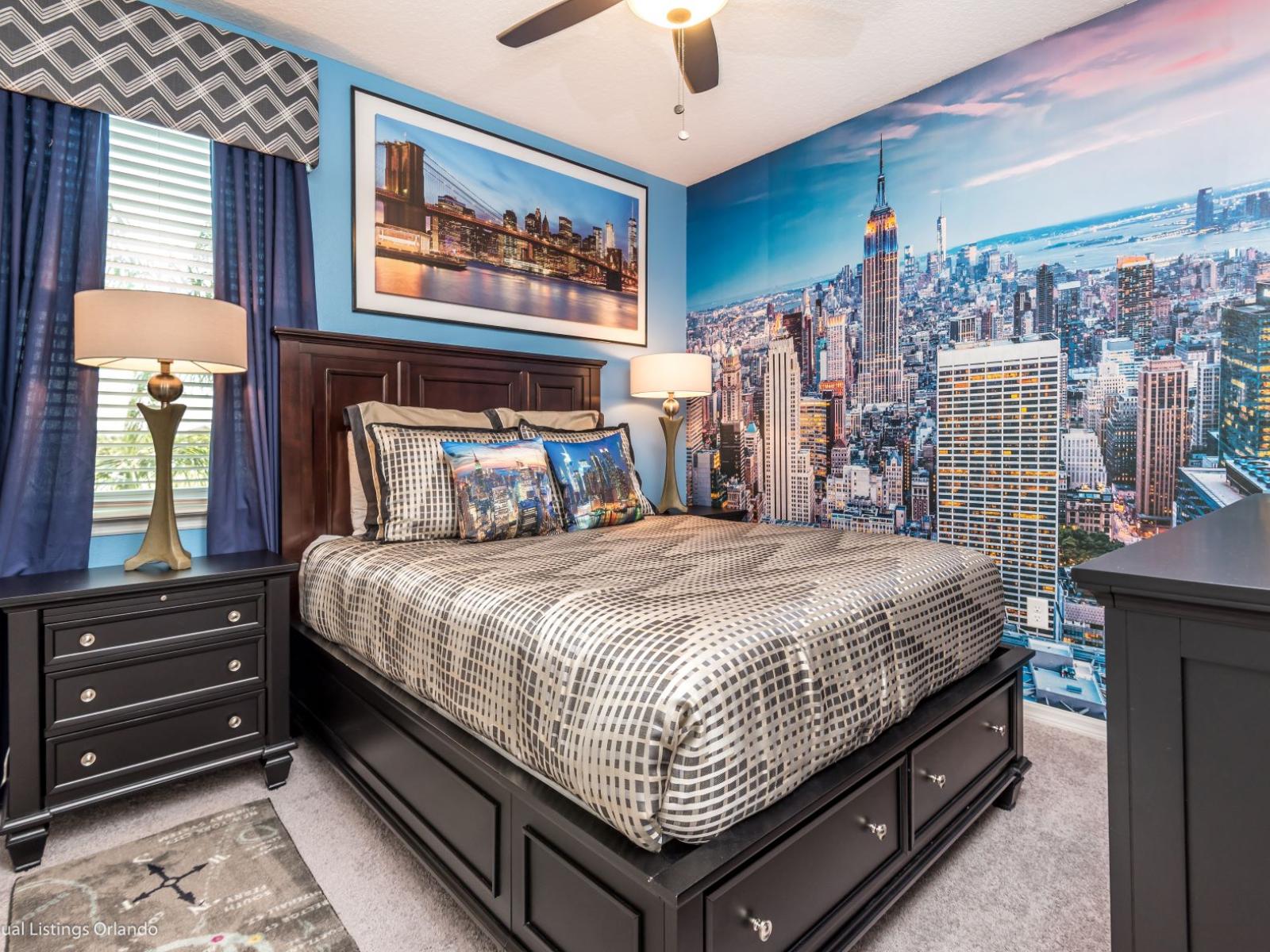 The bedroom with a city accent wall brings the urban landscape indoors. The skyline mural or artwork captures the bustling energy of city life, creating a focal point that inspires imagination and exploration