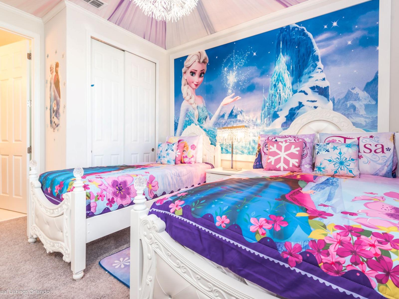 Step into a magical wonderland in this Frozen-themed room, featuring two enchanting single beds and a smart TV.