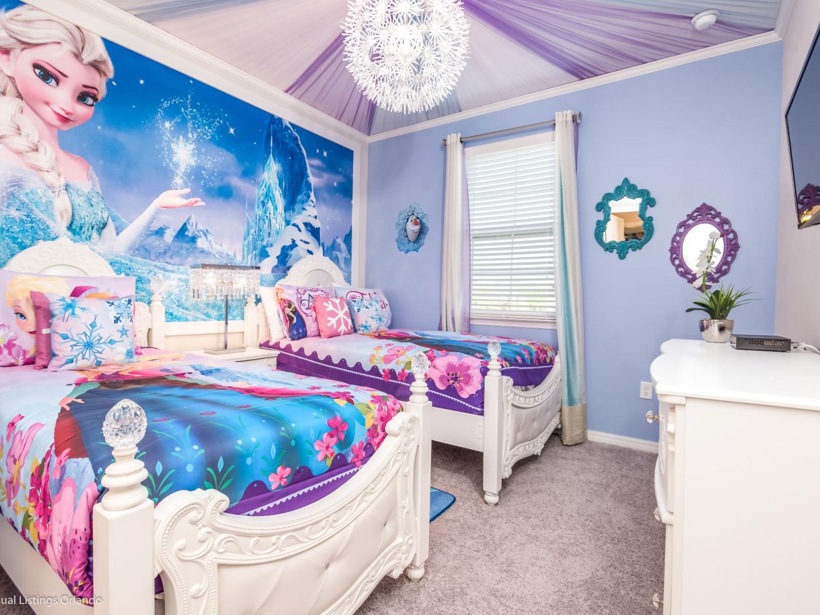 Frozen-themed bedroom of the villa in Kissimmee Florida - Offering two plush single beds - Thoughtfully designed bedroom featuring functional and stylish furniture - A smart TV for entertainment