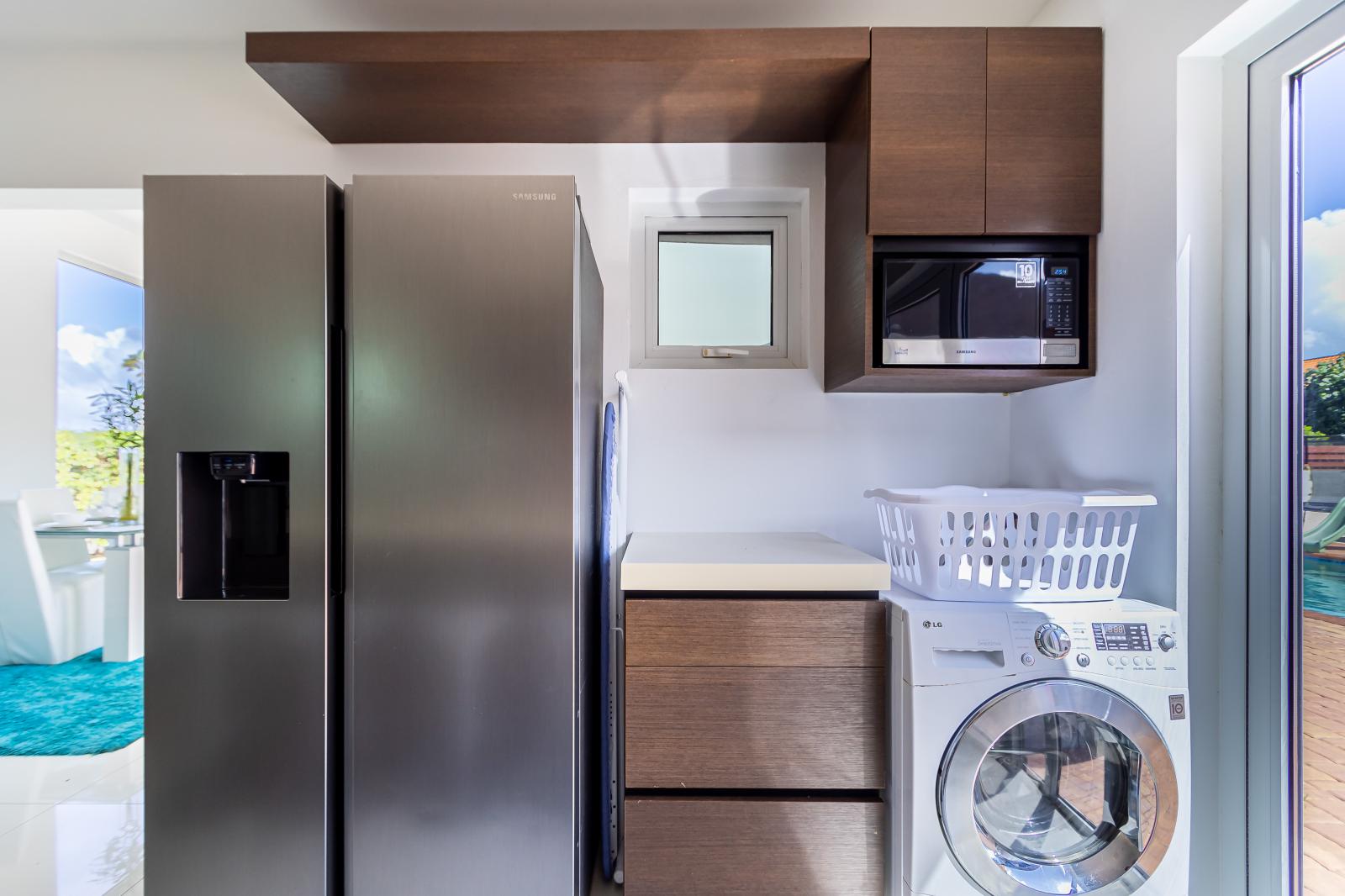 The kitchen is contemporary with a midcentury modern edge