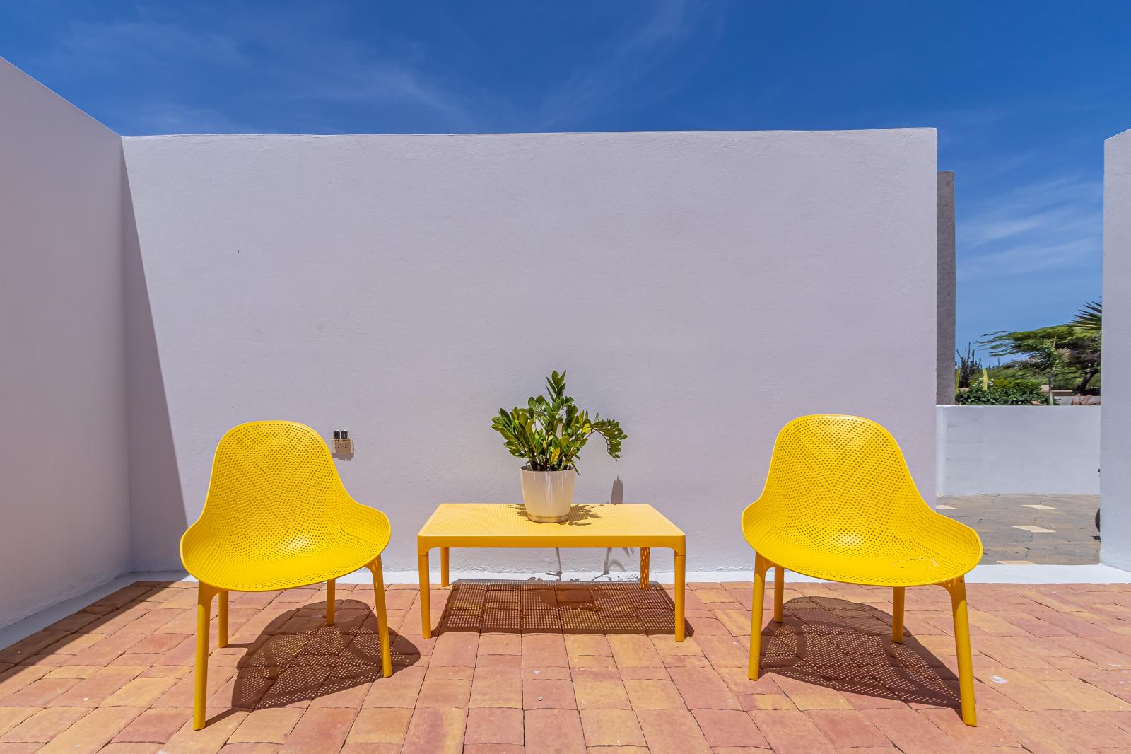 Nestle into comfort with our cozy outdoor seating. Whether it's a morning coffee or an evening chat under the stars, our inviting setup promises relaxation and camaraderie.