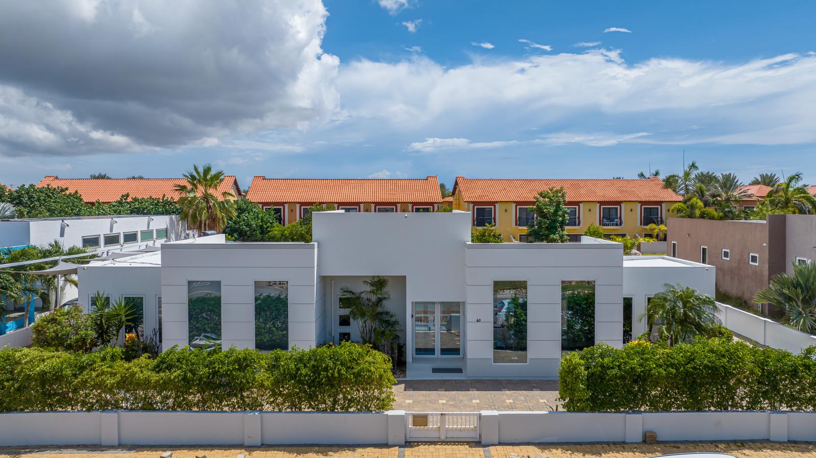 Discover curb appeal at its finest! Feast your eyes on our charming home from the street, a picturesque retreat that beckons with its inviting allure. Your dream escape awaits.