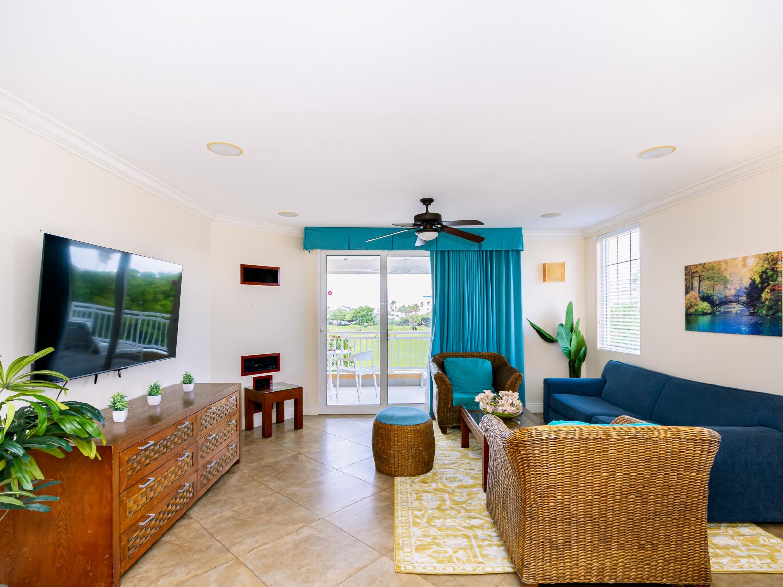 The spacious living room has beautiful lake and ocean views