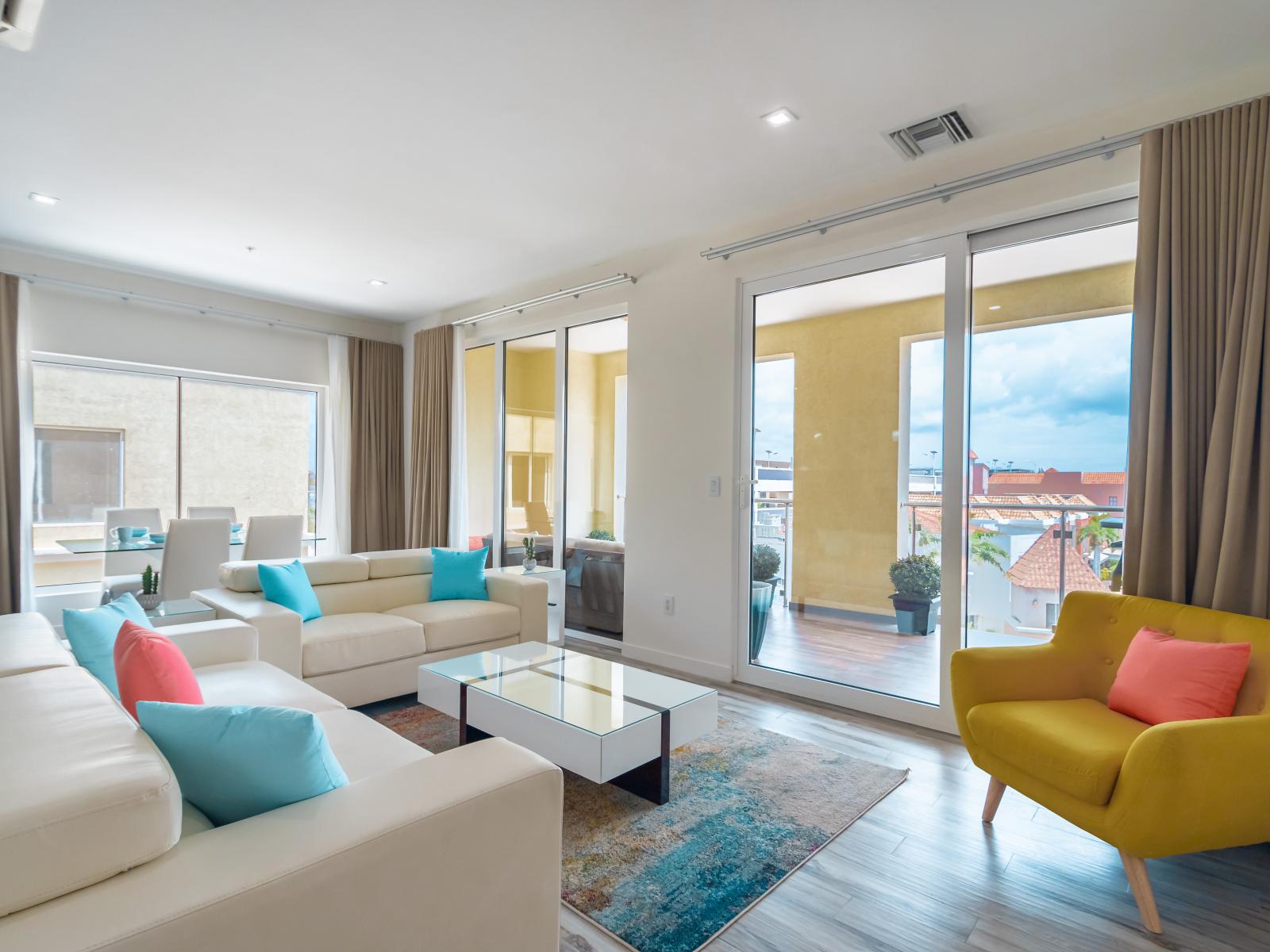 Living room connects to the balcony with sliding doors