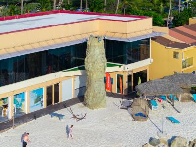 Divi Village rock climbing wall on the beach