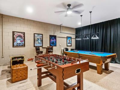 Game room of the home in Davenport Florida - Foosball, Pool Table, Skee-Ball, Arcade Games - A diverse selection of games and activities for every interest - Hours of enjoyment with a pool table and foosball table