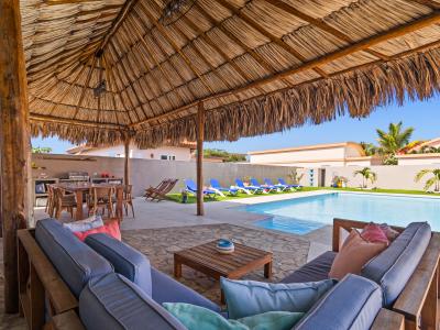 Unwind in paradise: retreat under the shade of our charming palapa beside the refreshing pool, where moments of relaxation and rejuvenation await.