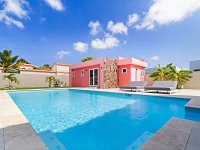 Dive into bliss: our crystal-clear pool awaits, surrounded by inviting lounge chairs, where you can bask in the sun and soak up moments of pure relaxation.