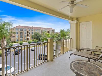 Mesmerizing private balcony of the condo in Orlando  - Cozy table and seats to enjoy the surrounding views - Be sure to get outside and enjoy the fantastic and stunning sunset views from your private balcony