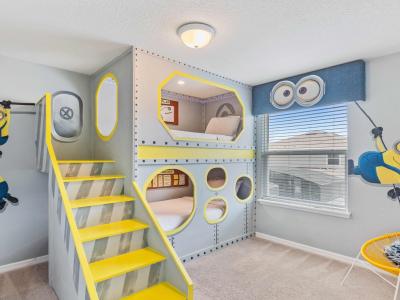 Welcome to the Minion-themed bedroom, where the whimsical world of minions comes to life. With two single beds adorned in playful motifs, it's a vibrant retreat where imagination runs wild and laughter fills the air.