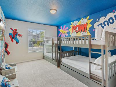 Themed kids room with 4 double beds
