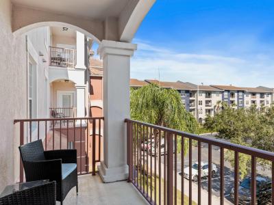 Indulge in the private balcony of the condo in Orlando - Provides a tranquil retreat where you can enjoy the fresh air and soak up - Enjoy beautiful views of the resort or surrounding landscape.