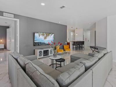 Enjoy our spacious living area, perfect for entertaining you and your friends with a large TV to watch your favorite games, shows, and movies.