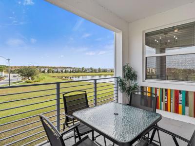 Balcony area with outdoor dining