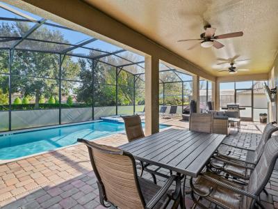 Al Fresco Dining Paradise: Enjoy the perfect blend of indoor comfort and outdoor beauty in our dining area, where the pool becomes your picturesque backdrop.