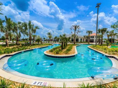 Splendid Shared Pool of the Apartment in Kissimmee - Cosy beach chairs available - Dive into refreshing poolside escape - Immerse yourself in the cool elegance of our pool - Experience ultimate relaxation in our poolside paradise