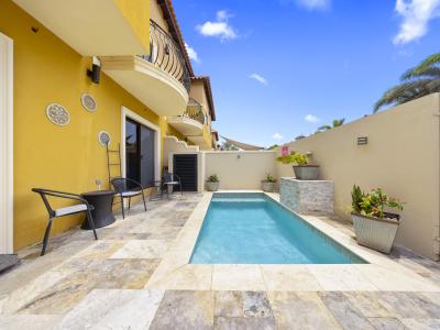 - Enjoy ultimate privacy and relaxation in the private pool of the townhouse in Noord, Aruba - Enjoy a peaceful swim in the privacy of the townhouse's own pool. - Relax in style with the townhouse's beautifully designed private pool area.