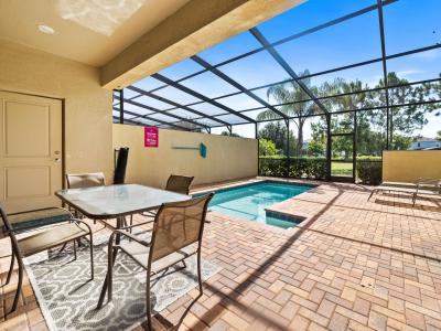 Private Pool with a outdoor dining area