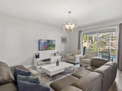 Entertainment Ready:  Enjoy movie nights or casual chats in this cozy living space, equipped with ample seating and a welcoming ambiance for family and friends.