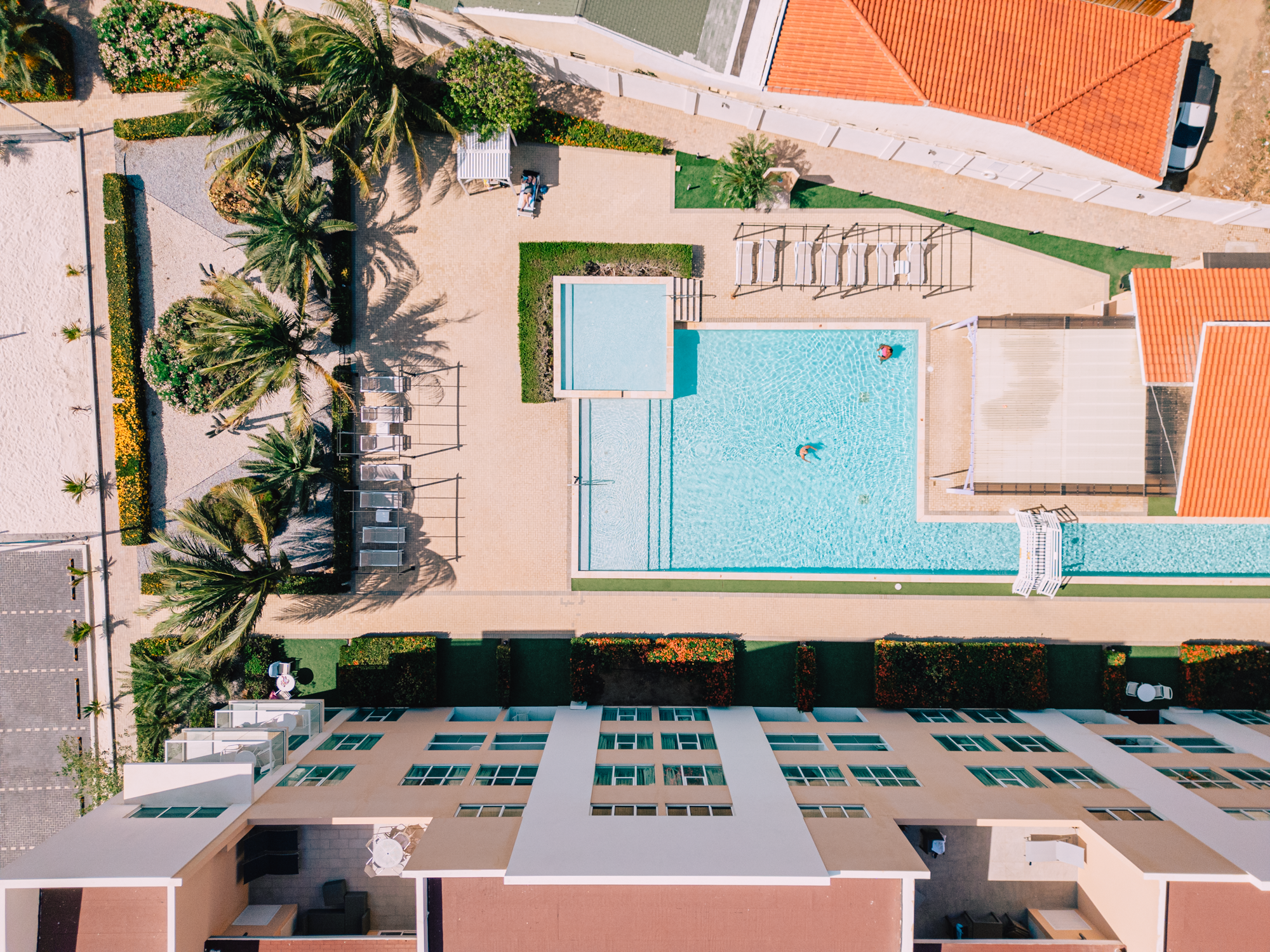 Resort pool with lounge chairs