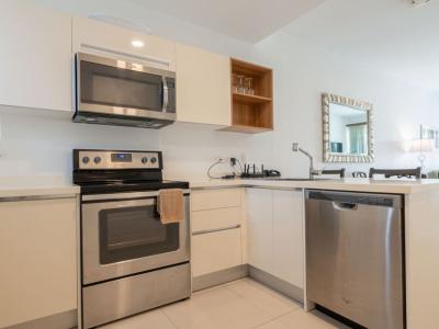 Well equipped kitchen with modern appliances makes meal prep simple & enjoyable - Sleek countertops & plenty of space provide convenience for cooking or snacking - Enjoy a home cooked meal before heading out to Noord’s beaches, shops & sights