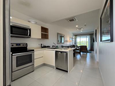 Cook & dine in this bright, open concept space designed for effortless living - Fully equipped kitchen with sleek appliances makes meal prep a breeze - Flow seamlessly from kitchen to dining to the cozy living area, leading to a balcony view