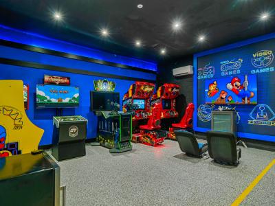 Private game room with arcade games and game console