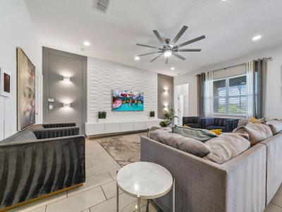 Open living area with large seating and smart TV