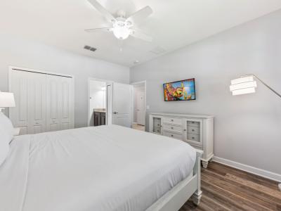 Bedroom 1 with a king size bed and a private bathroom