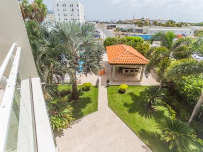 Relax in our poolside paradise, surrounded by lush greenery and sunlight. Lounge on a sunbed, take a refreshing dip, or simply unwind in nature's beauty.