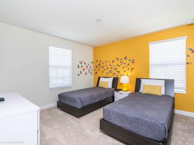 Swish Bedroom of the Home in Davenport Florida - The relaxing tones and comfortable décor create the perfect atmosphere for a good night's sleep - Two Single beds - Smart TV and Netflix