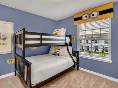 Minion themed kids room with single over double bunk bed