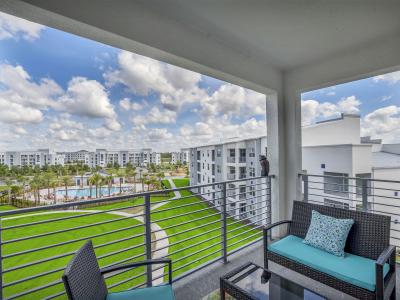 Stylish Condo w/Balcony, 5mi to Disney, Free Water Park Access On-Site