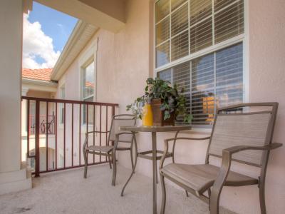 Sit back and relax while enjoying the view of the city in this private balcony.