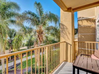 Set the stage for a lush escape on the private balcony of the condo in Orlando - Enjoy a space to relax and recharge away from the crowds with exclusive privacy - Perfect space  for relaxation and soaking up the sunshine