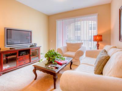 Magnificent Living Area of the Apartment in Orlando Florida - Smart TV and Netflix - Create lasting memories in our spacious and family-friendly living area - Thoughtfully designed for both relaxation and quality time together