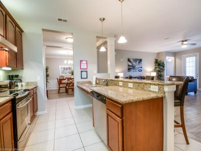 This inviting kitchen-where every detail is crafted for gourmet delights and memorable gatherings.